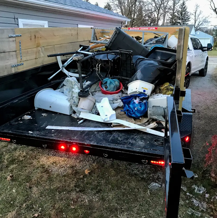 Roll-off dumpster delivered to a residential driveway in Prior Lake